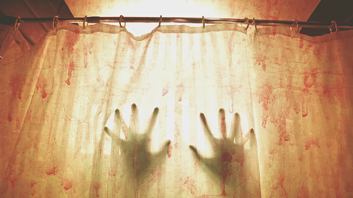 Image of Hands on a Bloody Shower Curtain Terror in the Corn