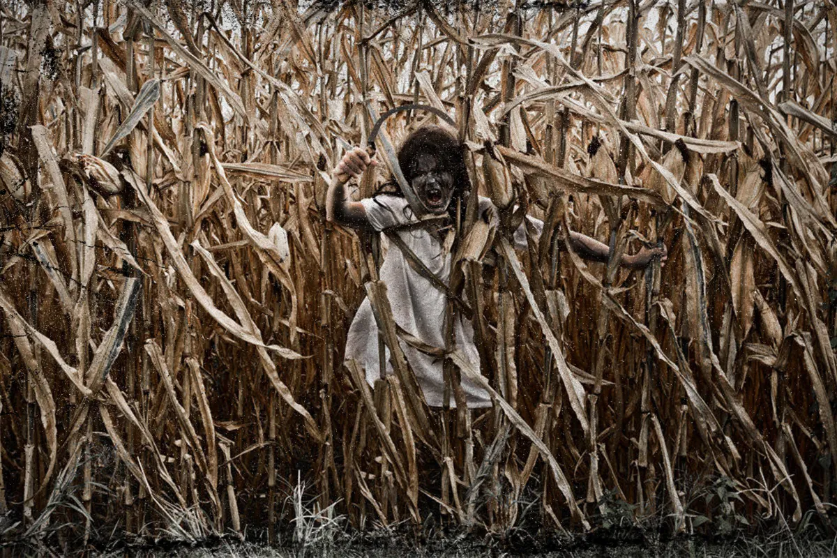 Creepy Girl Screaming with Curved Blade Weapon in Terror in the Corn Cornfield